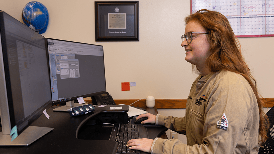 Woman works on computer